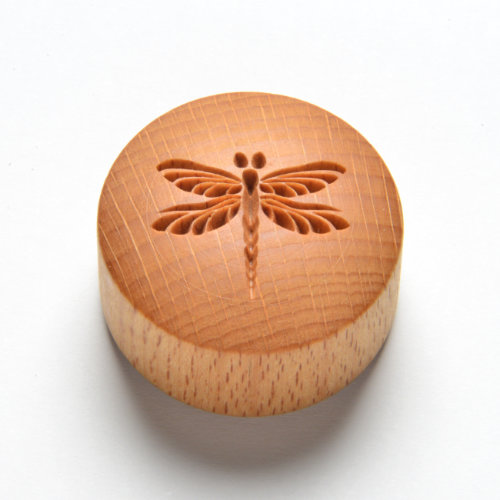 curve top dragonfly stamp