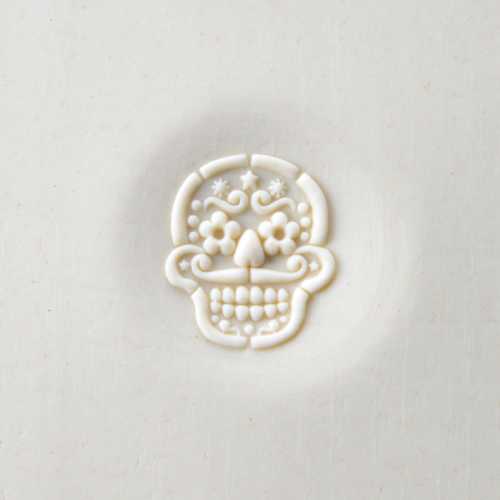 curve top Day of the Dead Skull pottery stamp